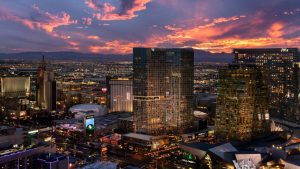 The Las Vegas skyline lit at dusk around Waldorf Astoria Las Vegas