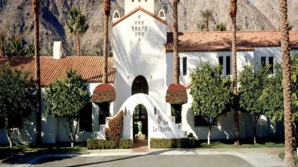 A white Spanish-style building with a red tile roof at La Quinta Resort & Club